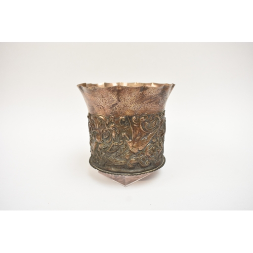 5052 - A William Comyns & Sons silver pot with frilled edge, slightly dented, the body embossed with birds ... 