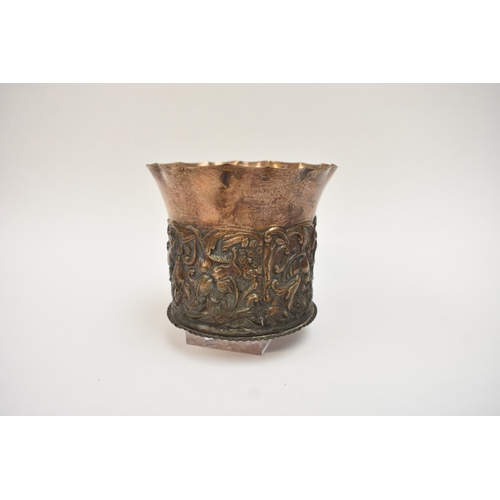 5052 - A William Comyns & Sons silver pot with frilled edge, slightly dented, the body embossed with birds ... 