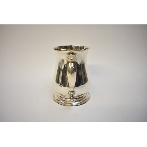 5072 - A Thos. Whipham & Wilm. Williams 18th Century George II silver pint mug of baluster form, with monog... 