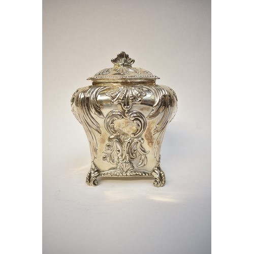 5080 - A George Fox Victorian silver tea canister, repoussé decoration of foliate swags over four scrolled ... 