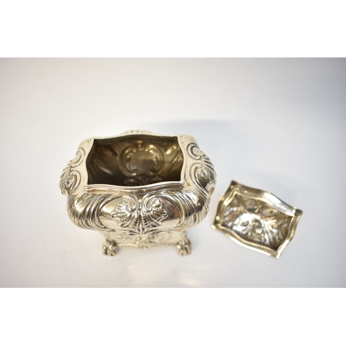 5080 - A George Fox Victorian silver tea canister, repoussé decoration of foliate swags over four scrolled ... 