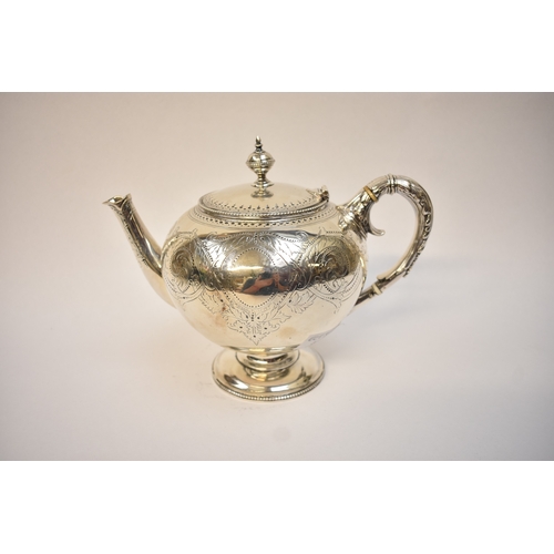 5075 - J.W. & Co., a Victorian silver teapot of pedestal form, ivory heat insulators, foliate repoussé to h... 