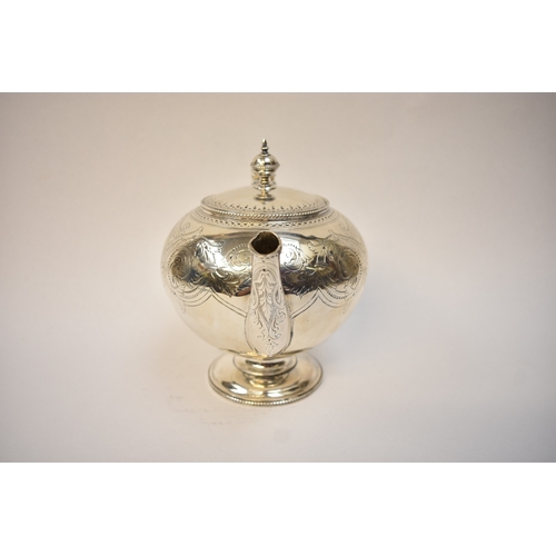 5075 - J.W. & Co., a Victorian silver teapot of pedestal form, ivory heat insulators, foliate repoussé to h... 