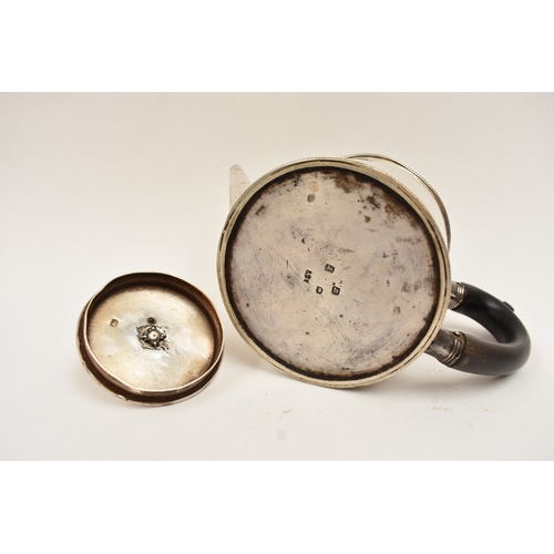 5013 - A James Young, George III silver drum shaped teapot with ebony handle and knob and engraved crest, L... 