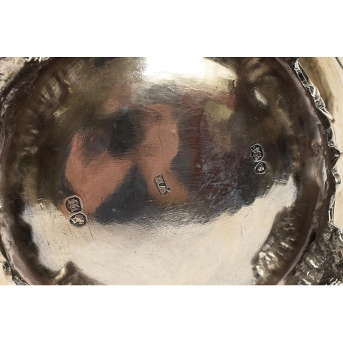 5019 - A William Hunter silver large milk jug with embossed floral and leaf detail, vacant cartouche, Londo... 