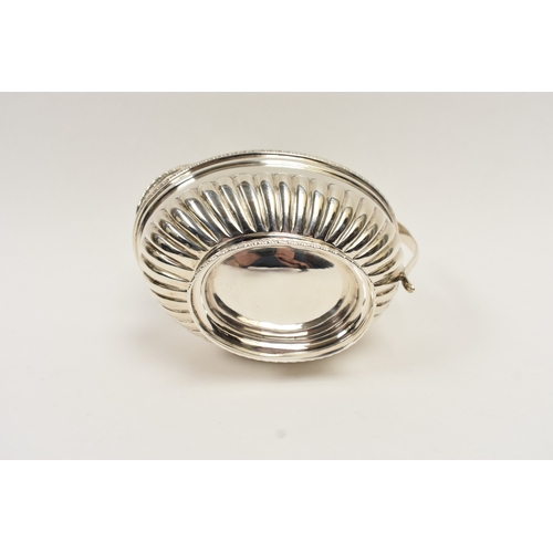 5011 - C.S. Harris & Sons Ltd silver sauce boat with melon-fluted detail, London 1927, 10cm tall x 14.5cm l... 