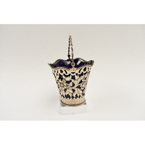 5010 - A George Fox silver sugar basket, the pierced body with floral detail, monogrammed cartouche, blue g... 