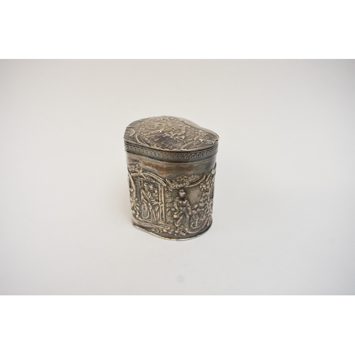 5018 - A Dutch imported silver heart form lidded container with embossed scenes.  Import marks for Samuel B... 
