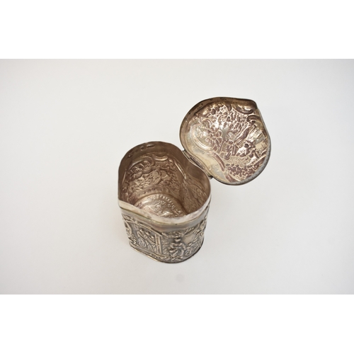 5018 - A Dutch imported silver heart form lidded container with embossed scenes.  Import marks for Samuel B... 