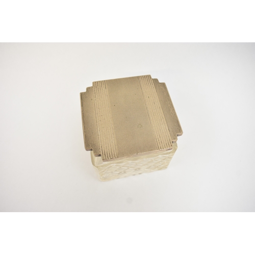 5044 - A crystal glass silver lidded container of Deco form.  The top marked 800, 7.5cm tall x 9cm x 9cm.  ... 
