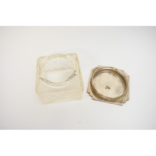 5044 - A crystal glass silver lidded container of Deco form.  The top marked 800, 7.5cm tall x 9cm x 9cm.  ... 