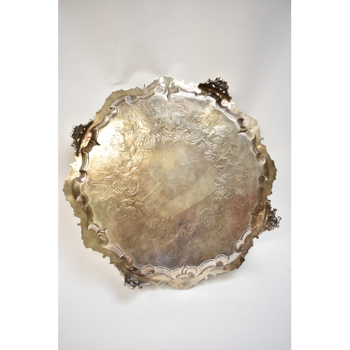 5001 - A William Ker Reid larger silver salver with shaped scroll and acanthus edge engraved floral and scr... 