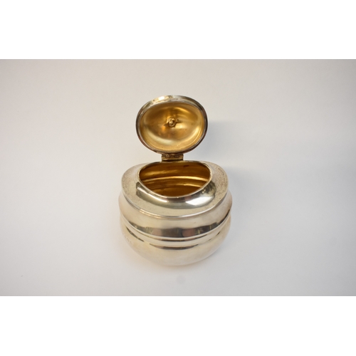 5051 - A Silver tea caddy with ebony knop finial of plain reeded form, makers mark rubbed, Birmingham 1926.... 