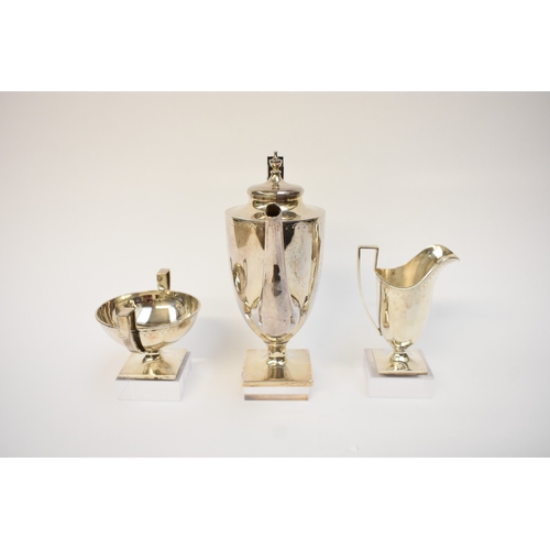 5009 - An American Theodora B Starr New York silver coffee pot for one with matching jug and sugar bowl wit... 