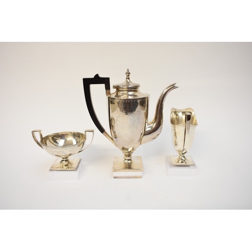 5009 - An American Theodora B Starr New York silver coffee pot for one with matching jug and sugar bowl wit... 