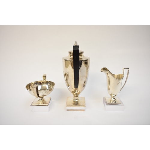 5009 - An American Theodora B Starr New York silver coffee pot for one with matching jug and sugar bowl wit... 