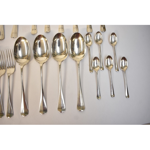 5107 - Goldsmiths & Silversmiths Co Ltd flatware including six large forks, six small forks, six soup spoon... 