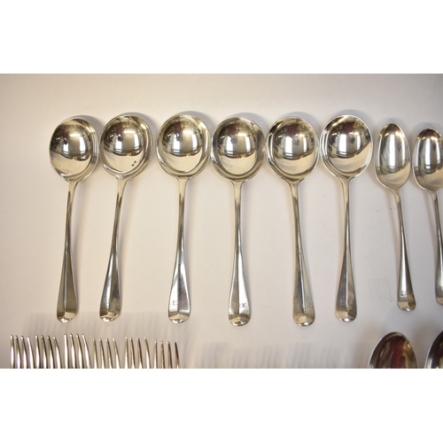 5107 - Goldsmiths & Silversmiths Co Ltd flatware including six large forks, six small forks, six soup spoon... 