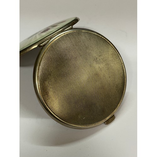 5109 - A Turner & Simpson Ltd silver and guilloche powder compact, the lid with sunray form pearl coloured ... 