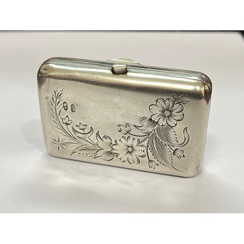 5081 - A Russian silver evening purse, rounded rectangular form with engraved foliage and floral sprays, st... 