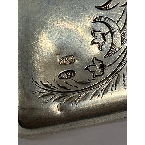 5081 - A Russian silver evening purse, rounded rectangular form with engraved foliage and floral sprays, st... 