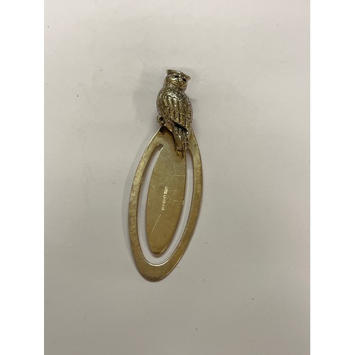 5111 - A Royal Mint silver page marker / bookmark, the finial as an owl, London 2001, 6.5cm long