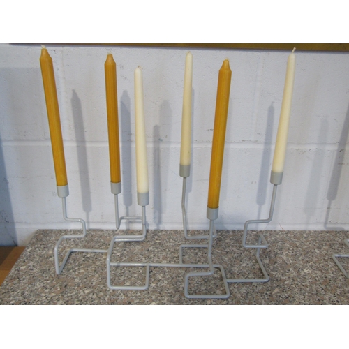 1011 - A pair of modern five arm candelabra