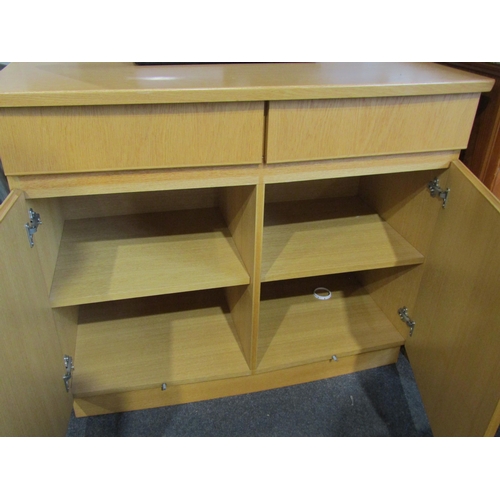 1016 - An oak sideboard with two drawers and soft close two door cupboard, 87cm tall x 101cm wide x 52cm de... 