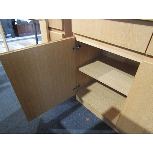 1012 - An oak sideboard with three drawers and three door cupboard, 86cm tall x 150cm wide x 52cm deep
