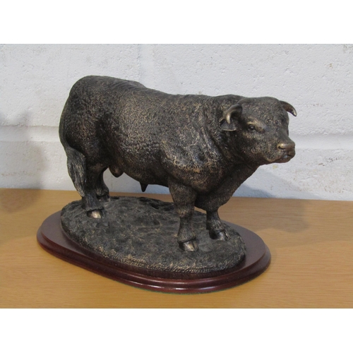 1014 - A Leonardo resin figure of a cart horse in bronze effect, 30cm tall, and a similar model of a bulloc... 