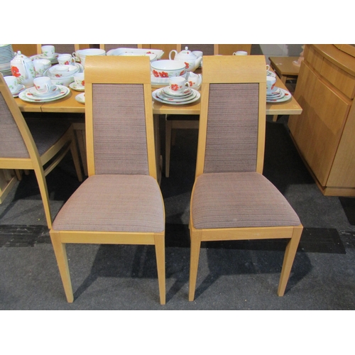 1019 - An oak extending dining table with two extra leaves, approximately 265cm long x 95cm wide extended, ... 