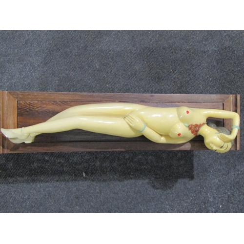 1032 - A reproduction Chinese physician's resin nude model with hardwood Oriental table, 52cm long