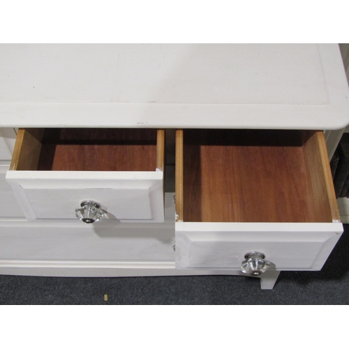 1046 - A painted chest of four short over two long drawers, bracket feet, 71cm tall x 103cm wide x 45cm dee... 