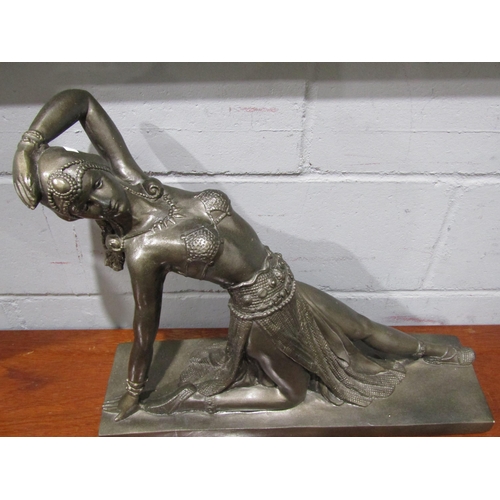 1057 - A reproduction bronze effect plaster statue of Deco dancer after Chiparus, 45cm tall