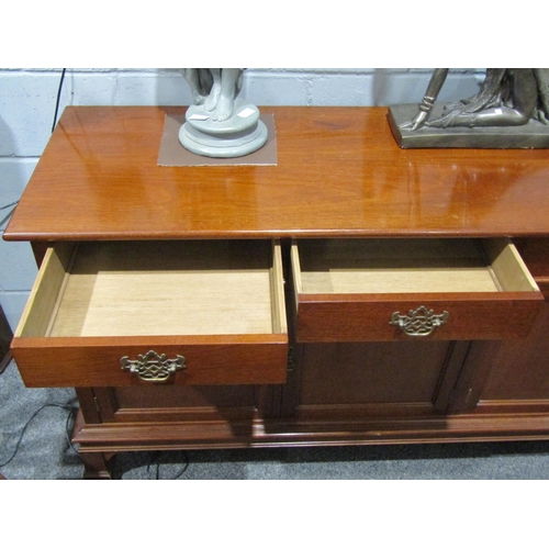1059 - A Georgian style mahogany four drawer and four cupboard dresser base, 84cm tall x 194cm wide x 51cm ... 