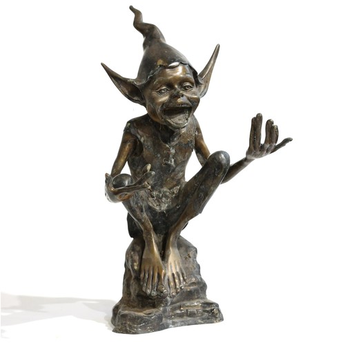 2059 - A bronze study of a seated garden pixie, 58cm tall
