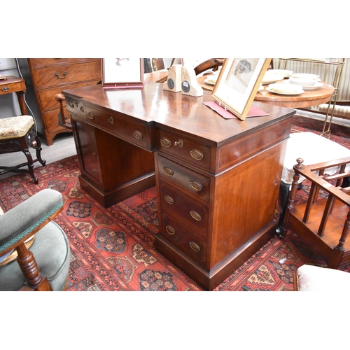 4016 - An Edwardian line inlaid mahogany breakfront twin pedestal desk, with three frieze drawers (each wit... 