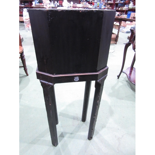 4007 - A Chinoiserie lacquered cabinet on stand with gilt figural and bird embellishment, three doors openi... 