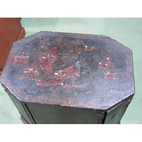 4007 - A Chinoiserie lacquered cabinet on stand with gilt figural and bird embellishment, three doors openi... 