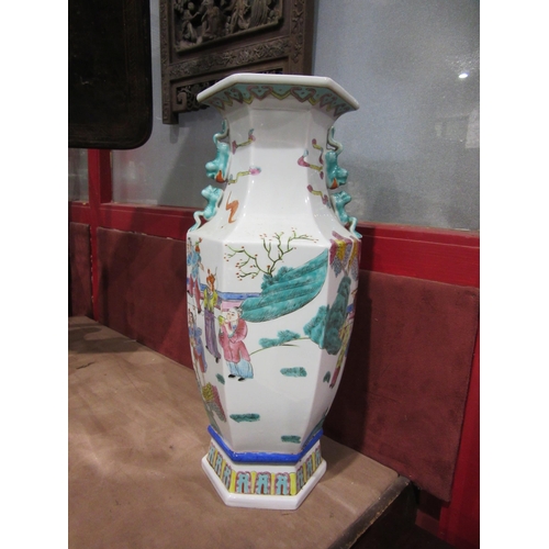 4009 - A reproduction Chinese hexagonal vase with figural design, 43.5cm height