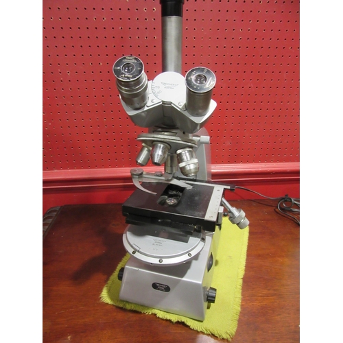 4014 - A Reichert laboratory microscope, four lens settings, made in Austria