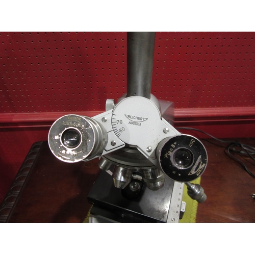 4014 - A Reichert laboratory microscope, four lens settings, made in Austria