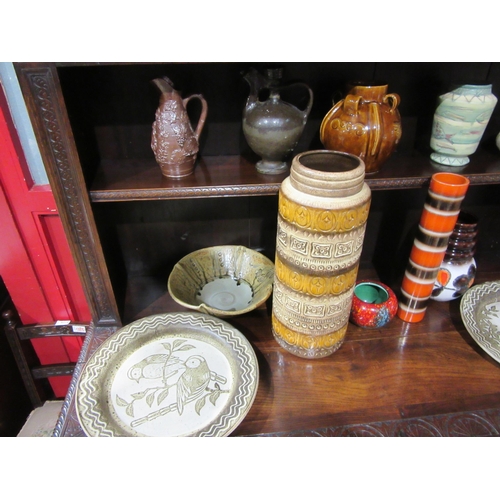 4019 - A collection of mostly 20th Century pottery and ceramics including two West German vases, Poole bowl... 