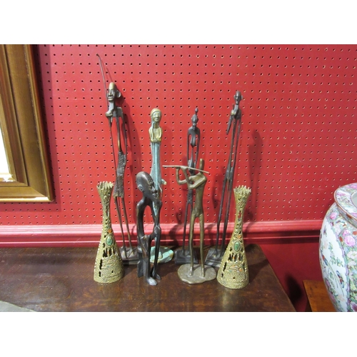 4029 - A group of metalware figures of sculptural form together with a pair of Wainberg Israel brass candle... 