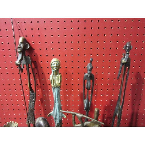 4029 - A group of metalware figures of sculptural form together with a pair of Wainberg Israel brass candle... 