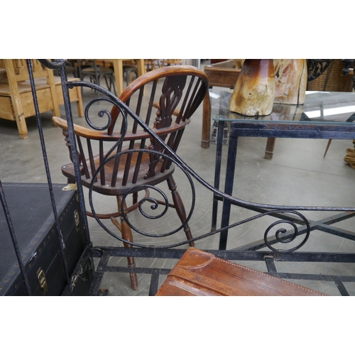 2060 - A 19th Century wrought and strap iron day bed