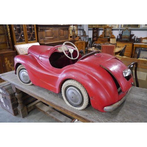 2001 - A 1950's red Austin J40 pedal car, in need of some TLC