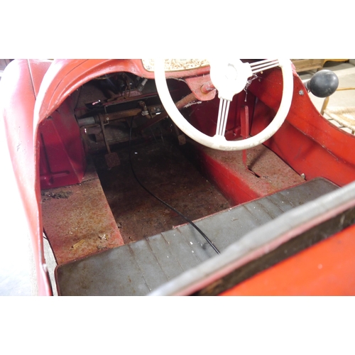 2001 - A 1950's red Austin J40 pedal car, in need of some TLC