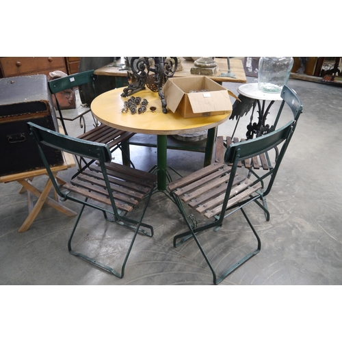 2015 - A set of four slatted green painted metal chairs, together with a circular top table (5)
