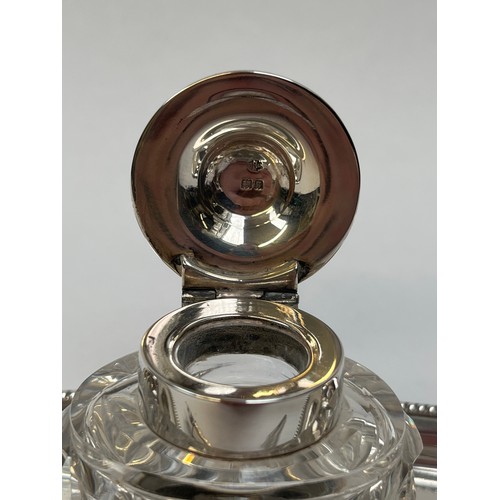 5060 - A William Hutton & Sons Ltd silver desk ink stand, oval boat form with gadrooned border, with origin... 